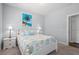 Bright bedroom with a queen bed, coastal decor, and ambient lighting at 3751 Copahee Sound Dr, Mount Pleasant, SC 29466