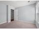 A carpeted bedroom features natural light from the window, white trim and doors at 3751 Copahee Sound Dr, Mount Pleasant, SC 29466