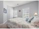 Comfortable bedroom featuring natural light, a queen-sized bed, and calm decor at 3751 Copahee Sound Dr, Mount Pleasant, SC 29466