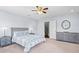 Well-lit bedroom featuring soft carpet, modern furnishings, and a serene atmosphere at 3751 Copahee Sound Dr, Mount Pleasant, SC 29466