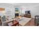 Cozy living room with a fireplace and comfortable seating at 3751 Copahee Sound Dr, Mount Pleasant, SC 29466