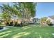 Beautiful backyard featuring lush greenery, mature trees, and a well-manicured lawn, creating a serene outdoor oasis at 3751 St Ellens Dr, Mount Pleasant, SC 29466