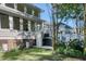 Charming backyard featuring a lift for accessibility, lush greenery, and a well-maintained lawn at 3751 St Ellens Dr, Mount Pleasant, SC 29466