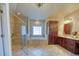 Bathroom features a glass shower, soaking tub, and dual vanities at 3751 St Ellens Dr, Mount Pleasant, SC 29466