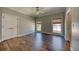 Bedroom features include hardwood floors, a ceiling fan, and two windows at 3751 St Ellens Dr, Mount Pleasant, SC 29466