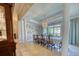 This elegant dining room offers grand entertaining with a chandelier and columns at 3751 St Ellens Dr, Mount Pleasant, SC 29466