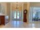 Bright foyer with tile floor and access to the dining room at 3751 St Ellens Dr, Mount Pleasant, SC 29466