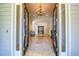 Elegant foyer with a chandelier, tile floor, and arched doorway into other rooms at 3751 St Ellens Dr, Mount Pleasant, SC 29466