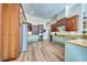 Spacious kitchen features custom cabinets, stainless appliances, and hardwood flooring at 3751 St Ellens Dr, Mount Pleasant, SC 29466