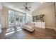 Bright living room features a wall of windows and a built-in bookcase at 3751 St Ellens Dr, Mount Pleasant, SC 29466