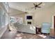 Elegant living room with a fireplace and an abundance of natural light at 3751 St Ellens Dr, Mount Pleasant, SC 29466