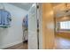 Walk-in closet with wood flooring and view to luxurious bathroom at 3751 St Ellens Dr, Mount Pleasant, SC 29466