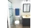 Bathroom features a vanity with drawers, toilet and a shower at 3784 Scotts Mill Dr, North Charleston, SC 29420