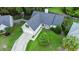 Charming one story home featuring a two-car garage, and landscaped front yard at 402 Equinox Cir, Ladson, SC 29456