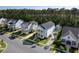 Aerial view of a neighborhood featuring well-maintained homes, tree-lined streets, and manicured lawns at 4114 Maidstone Dr, Mount Pleasant, SC 29466