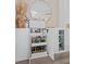 Home bar area with custom cabinets, beverage storage, and a stylish countertop at 4114 Maidstone Dr, Mount Pleasant, SC 29466