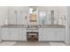 Bathroom features dual vanities, granite countertops, and a walk-in shower at 4114 Maidstone Dr, Mount Pleasant, SC 29466