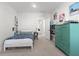 Cozy bedroom with an ample turquoise dresser and a blue bed at 4114 Maidstone Dr, Mount Pleasant, SC 29466