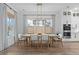 Bright dining room with a modern chandelier and seating for eight at 4114 Maidstone Dr, Mount Pleasant, SC 29466