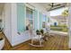 Cozy front porch with rocking chairs creating a relaxing outdoor living space at 4114 Maidstone Dr, Mount Pleasant, SC 29466