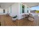 Inviting porch with light-stained wood flooring and comfortable seating arrangements at 4114 Maidstone Dr, Mount Pleasant, SC 29466