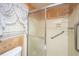 Shower enclosure with a glass sliding door, grab bar and accessible fixtures at 4328 Cheviot Dr, North Charleston, SC 29418