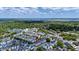 An aerial view of lovely townhomes surrounded by lush green trees and landscaping at 4404 Avery Ave, North Charleston, SC 29405