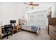 Neutral bedroom with carpeted floors features a ceiling fan and natural light at 4404 Avery Ave, North Charleston, SC 29405
