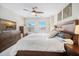 Comfortable bedroom featuring a ceiling fan, neutral walls, and natural light at 4404 Avery Ave, North Charleston, SC 29405