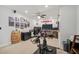 Spacious bonus room featuring a ceiling fan, gaming setup, and workout equipment at 4404 Avery Ave, North Charleston, SC 29405