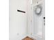 Minimalist foyer with coat hooks and a frosted glass front door at 4404 Avery Ave, North Charleston, SC 29405