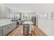 Bright kitchen with a large island, stainless steel appliances, and sleek cabinetry at 4404 Avery Ave, North Charleston, SC 29405