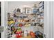 Walk-in pantry with wire shelving, stocked with various food items and household goods at 4404 Avery Ave, North Charleston, SC 29405