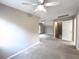 Spacious room with natural light, neutral walls, carpet and ceiling fans at 4818 Holly Berry Ln, Summerville, SC 29485