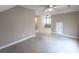 Spacious room with natural light, neutral walls, carpet and ceiling fans at 4818 Holly Berry Ln, Summerville, SC 29485