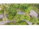 Aerial view of home showcasing mature trees and neighborhood, revealing a peaceful setting at 4924 France Ave, North Charleston, SC 29405