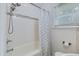Bright bathroom with tiled shower and tub combination offers a clean and refreshing space at 4924 France Ave, North Charleston, SC 29405
