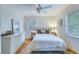 Cozy bedroom with a ceiling fan, area rug, and plenty of natural light at 4924 France Ave, North Charleston, SC 29405