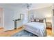 Well-lit bedroom featuring a ceiling fan, area rug, and plenty of natural light at 4924 France Ave, North Charleston, SC 29405