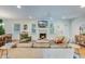 Bright living room features a cozy fireplace, hardwood flooring, and an open layout for modern living at 4924 France Ave, North Charleston, SC 29405
