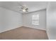 Bright bedroom with neutral carpet, ceiling fan, and one window offering natural light at 4977 Ballantine Dr, Summerville, SC 29485