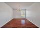 Dining room featuring hardwood floors, a chandelier, and natural light from the window at 4977 Ballantine Dr, Summerville, SC 29485
