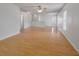 Bright living room with hardwood floors, ceiling fan, white walls and natural light at 4977 Ballantine Dr, Summerville, SC 29485