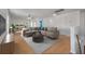 This living space offers hardwood flooring, recessed lighting, and neutral walls at 4977 Ballantine Dr, Summerville, SC 29485