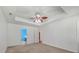 The open Primary bedroom showcases neutral carpeting and walls with a view to the en suite bathroom at 4977 Ballantine Dr, Summerville, SC 29485