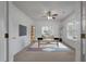 Modern office with a desk, ceiling fan, and large windows for natural light at 4977 Ballantine Dr, Summerville, SC 29485