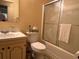 A full bathroom features a swan designed glass shower door at 5 Apple Cir, Goose Creek, SC 29445