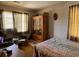 Bright bedroom includes a large wooden wardrobe at 5 Apple Cir, Goose Creek, SC 29445