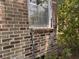 Shows deterioration of the mortar on the foundation of this brick house and cracking below a window sill at 5 Apple Cir, Goose Creek, SC 29445