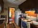 A functional kitchen includes a white refrigerator and stove at 5 Apple Cir, Goose Creek, SC 29445